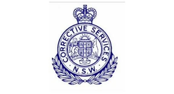 The blue crest logo of Corrective Services NSW, featuring a crown and wreath, representing the prison system where a Criminal defence lawyer Sydney firm defends clients in custody.