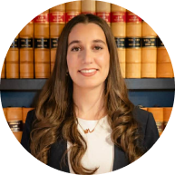 A large stone mural of the New South Wales state crest featuring a lion and kangaroo with the motto Orta Recens Quam Pura Nites at a Criminal defence firm Sydney CBD venue.